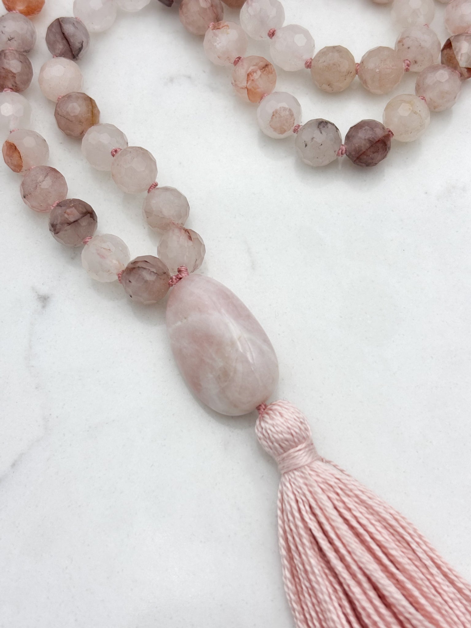 hematoid quartz gemstone mala necklace with pink beryl guru bead and pink tassel | radiant malas | handmade in boulder, colorado