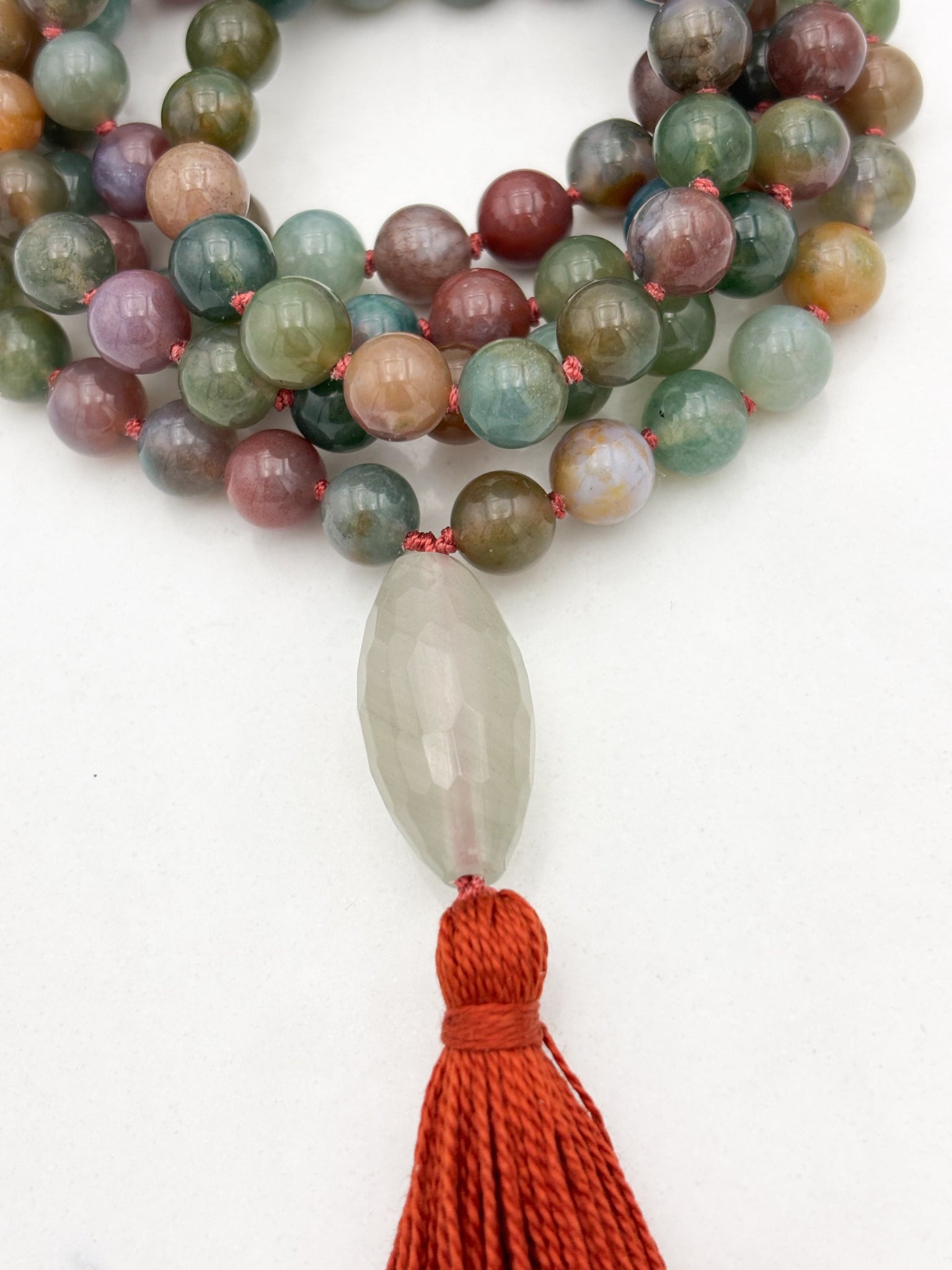 indian agate gemstone mala with faceted quartz guru bead and orange tassel | radiant malas | handmade in boulder, colorado