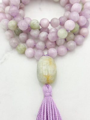 kunzite gemstone mala with beryl guru bead and lilac tassel | radiant malas  handmade in boulder, colorado