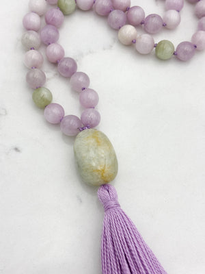 kunzite gemstone mala with beryl guru bead and lilac tassel | radiant malas  handmade in boulder, colorado