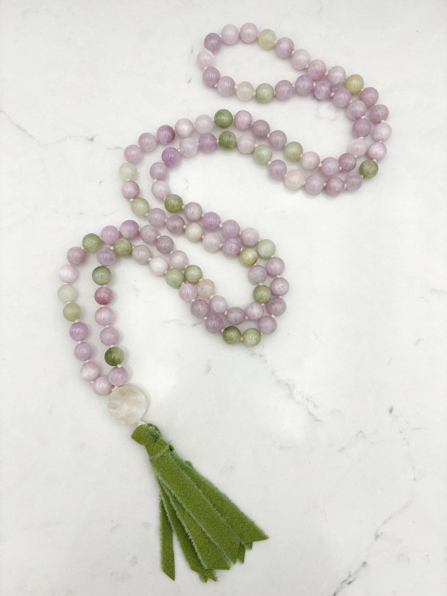 kunzite gemstone mala with druzy quartz guru bead and green silk tassel | radiant malas | handmade in boulder, colorado