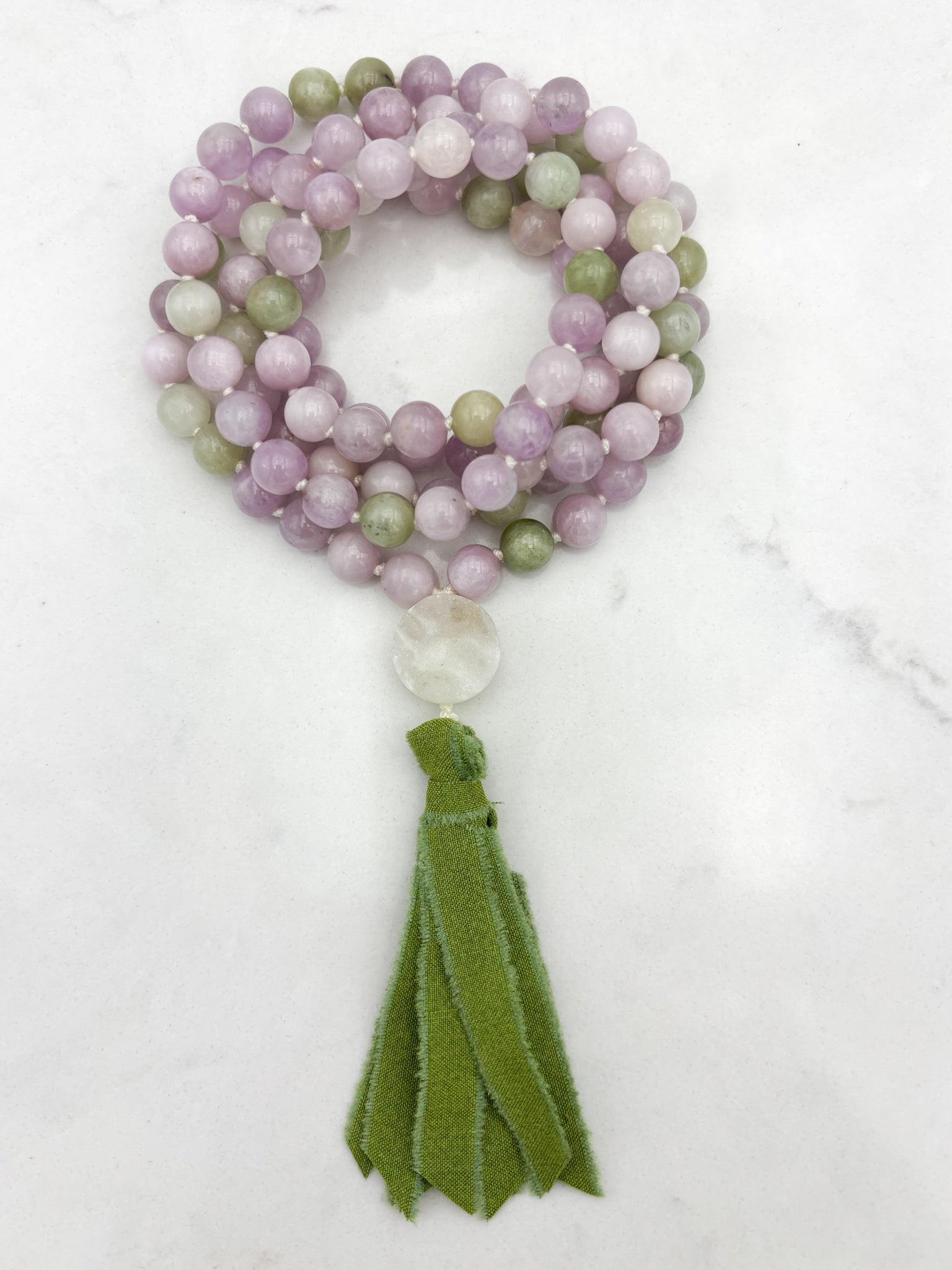 kunzite gemstone mala with druzy quartz guru bead and green silk tassel | radiant malas | handmade in boulder, colorado