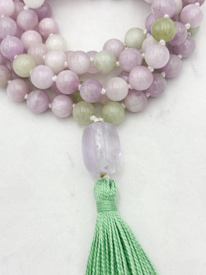 kunzite gemstone mala with lilac amethyst guru bead and green tassel | radiant malas  handmade in boulder, colorado