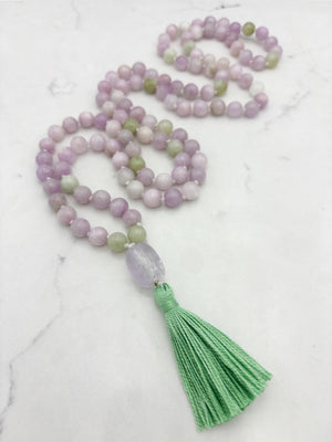 kunzite gemstone mala with lilac amethyst guru bead and green tassel | radiant malas  handmade in boulder, colorado
