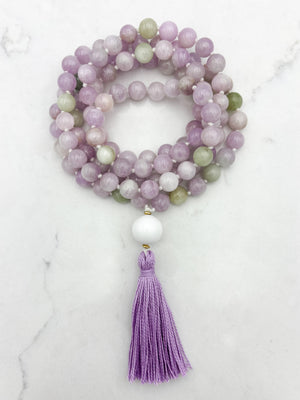 kunzite gemstone mala with white agate guru bead and lilac tassel | radiant malas  handmade in boulder, colorado