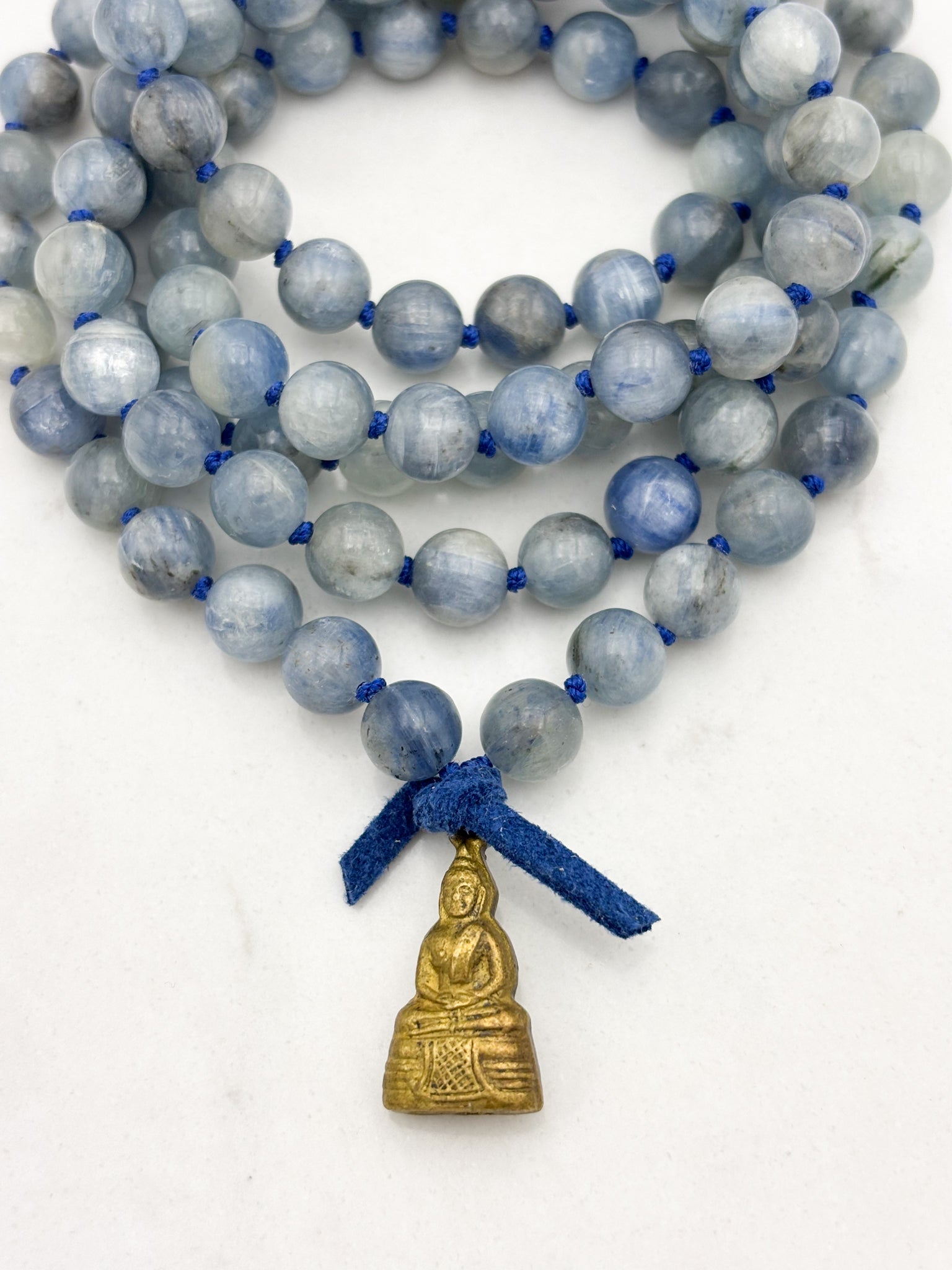 kyanite gemstone mala with brass buddha pendant | radiant malas | handmade in boulder, colorado