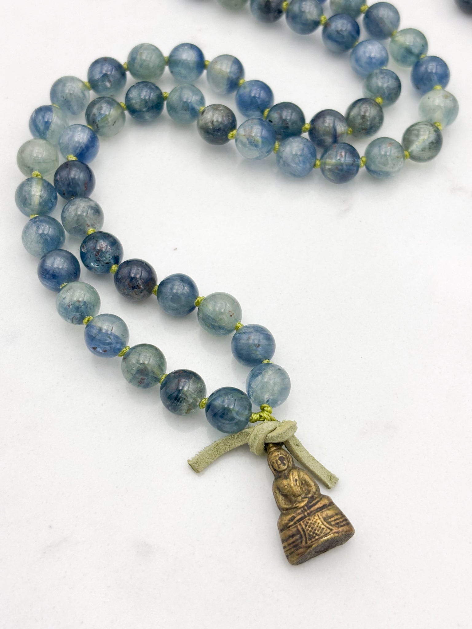 kyanite gemstone mala with brass buddha pendant | radiant malas | handmade in boulder, colorado