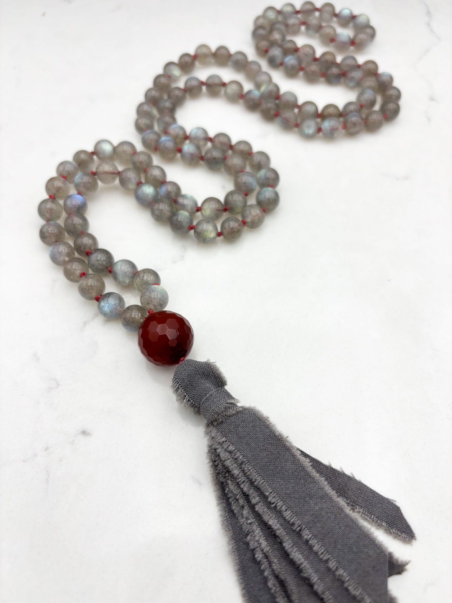 labradorite gemstone mala with carnelian guru bead and gray silk tassel | radiant malas | handmade in boulder, colorado
