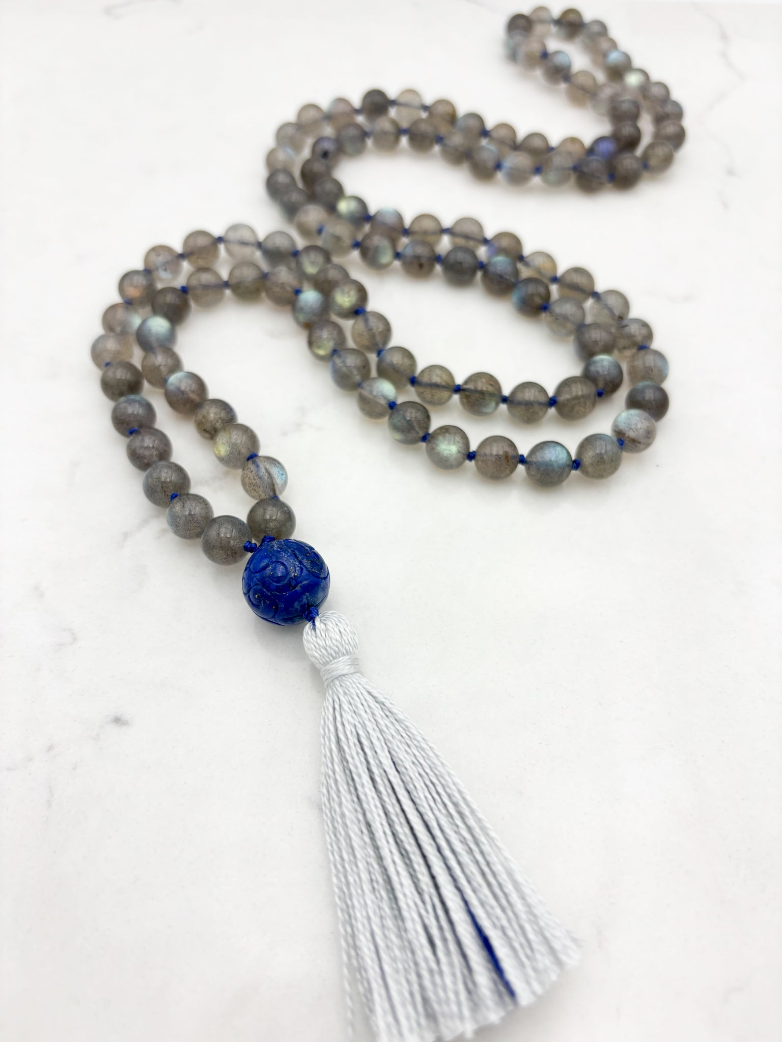 labradorite gemstone mala with carved lapis guru bead and gray tassel | radiant malas | handmade in boulder, colorado