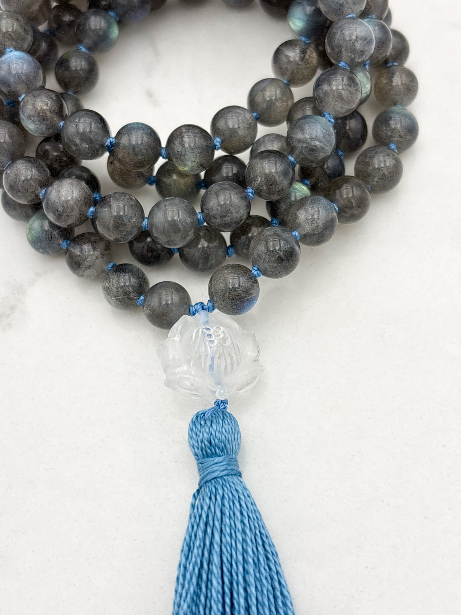 labradorite gemstone mala with clear quartz lotus guru bead and light blue tassel | radiant malas | handmade in boulder, colorado