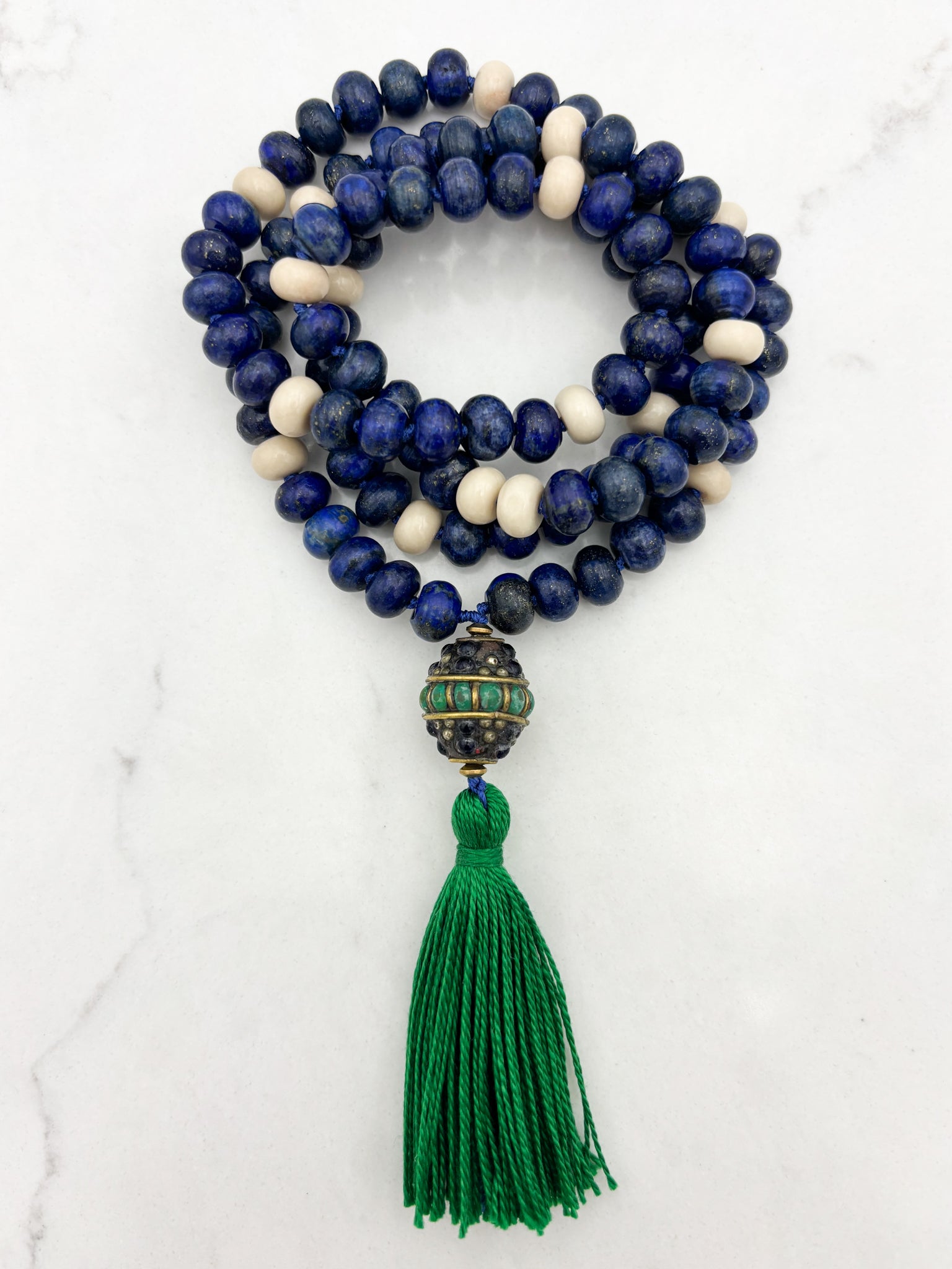 lapis and fossil jasper gemstone mala with vintage brass, lapis, turquoise guru bead and green tassel | radiant malas | handmade in boulder, colorado