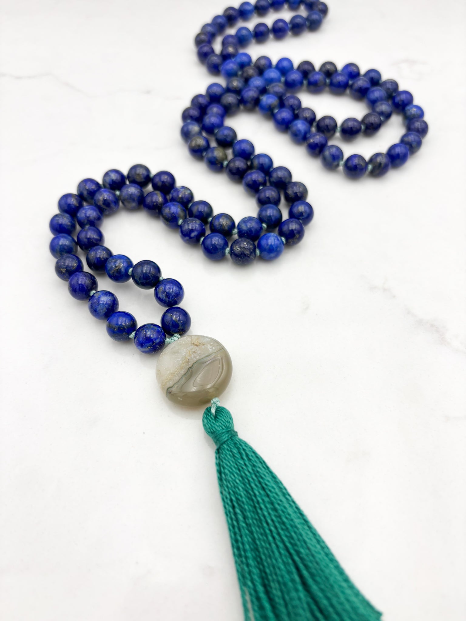 lapis gemstone mala with agate guru bead and green tassel | radiant malas | handmade in boulder, colorado