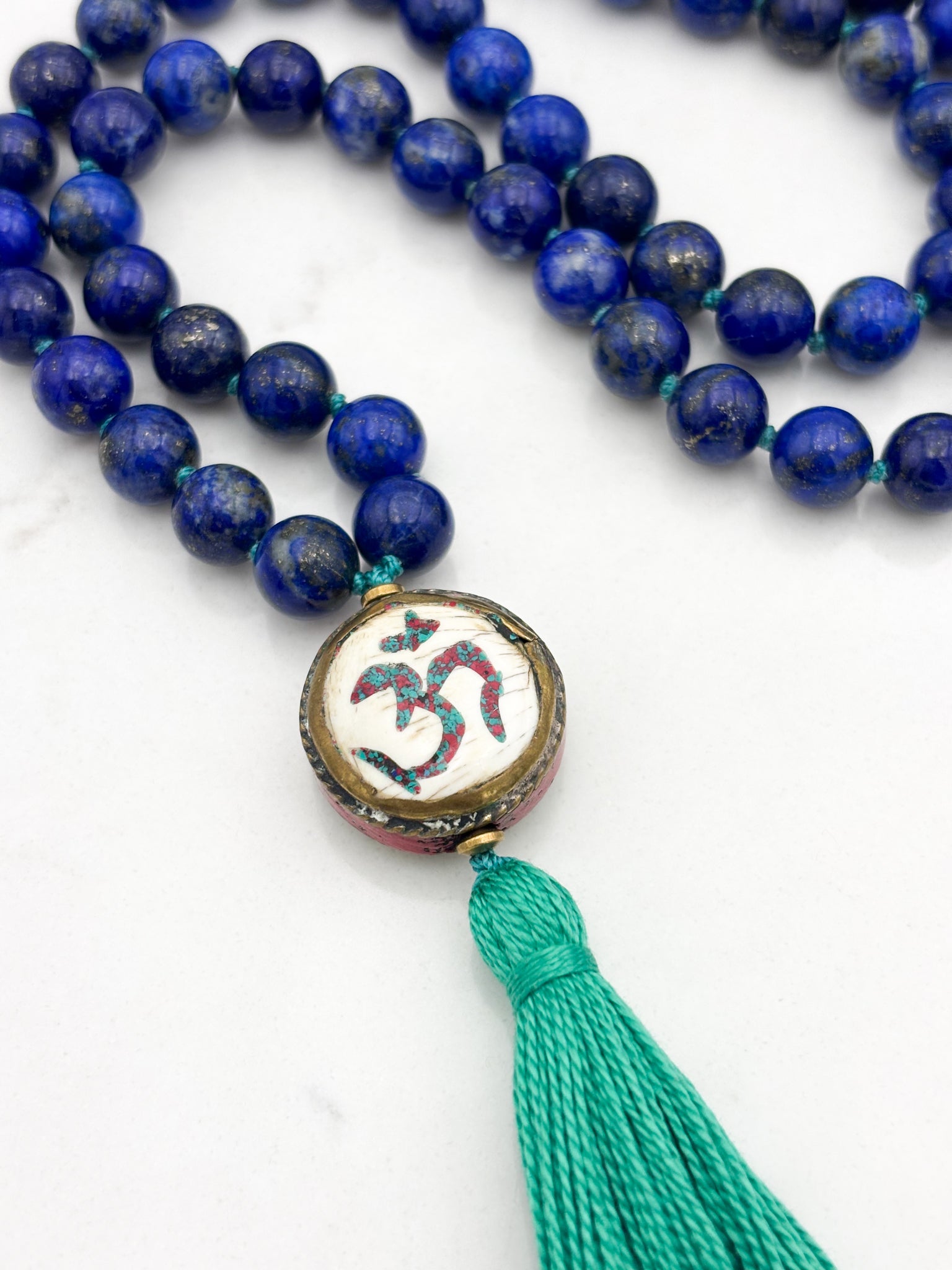 lapis gemstone mala with vintage brass guru bead and green tassel | radiant malas | handmade in boulder, colorado
