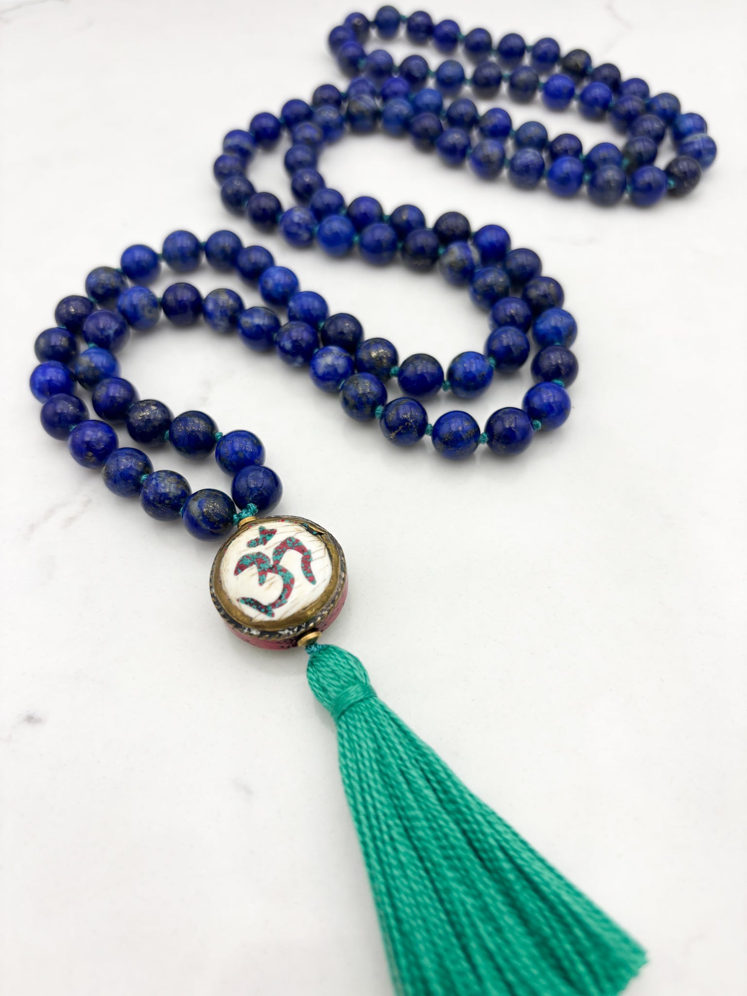 lapis gemstone mala with vintage brass guru bead and green tassel | radiant malas | handmade in boulder, colorado