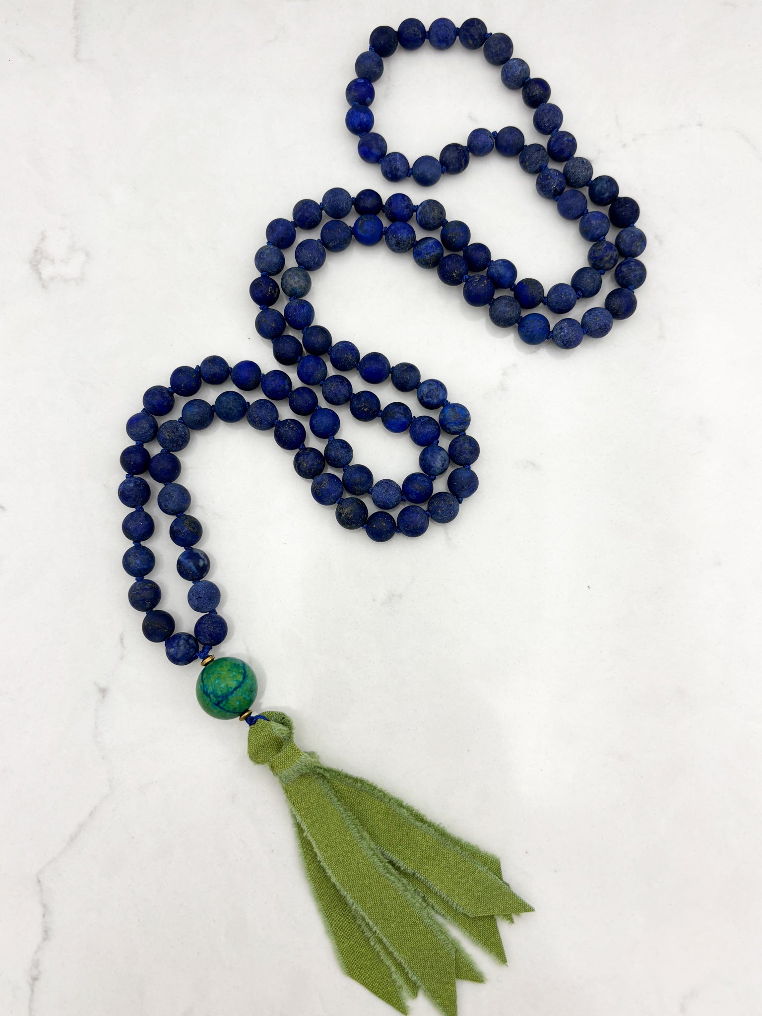 lapis gemstone mala necklace with chrysocolla guru bead and green silk ribbon tassel | radiant malas | handmade in boulder, colorado