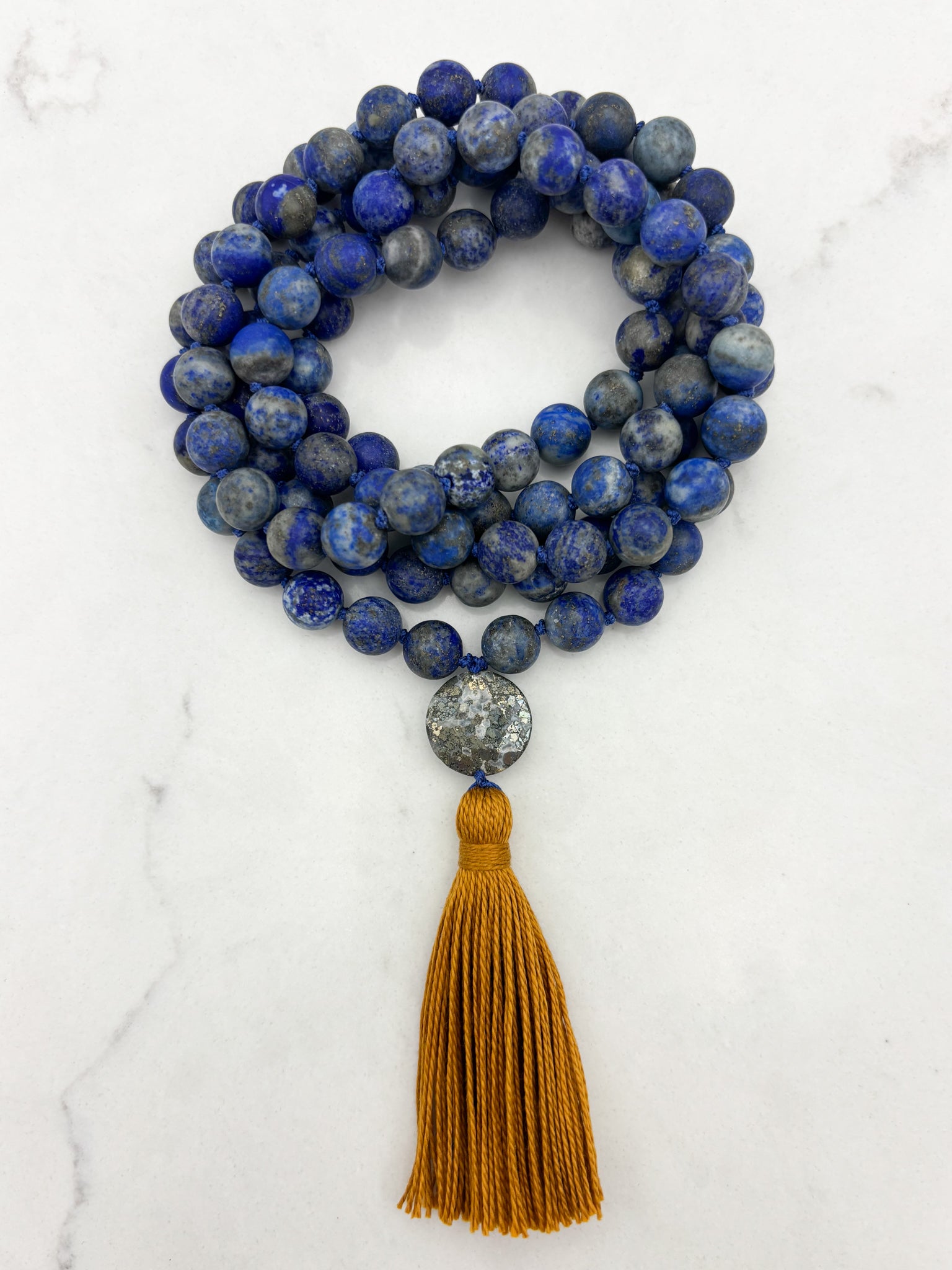 lapis gemstone mala with pyrite guru bead and gold tassel | radiant malas | handmade in boulder, colorado