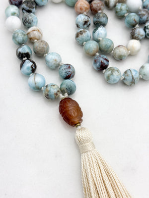 larimar gemstone mala with carnelian guru bead and ecru tassel | radiant malas | handmade in boulder, colorado