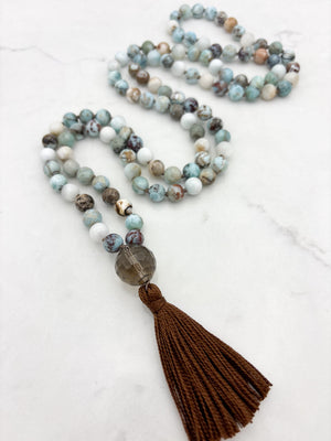 larimar gemstone mala with smoky quartz guru bead and brown tassel | radiant malas | handmade in boulder, colorado