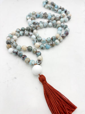larimar gemstone mala with white agate guru bead and rust tassel | radiant malas | handmade in boulder, colorado