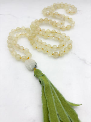 lemon quartz gemstone mala with aquamarine guru bead and green silk tassel | radiant malas | handmade in boulder, colorado