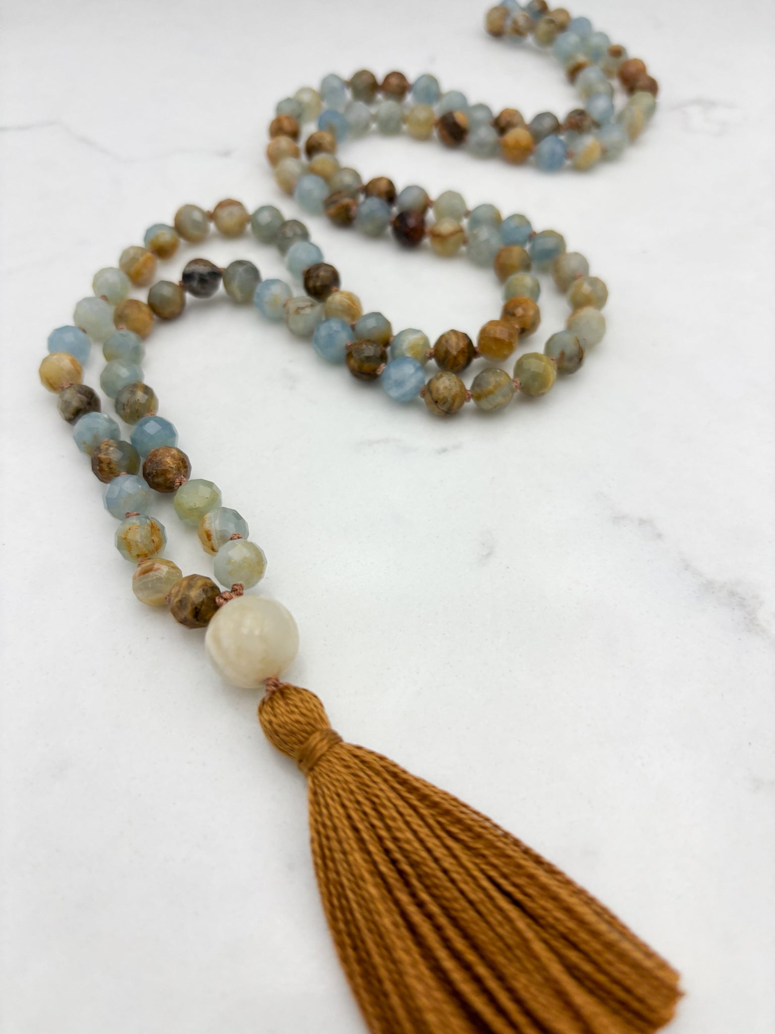 lemurian aquatine calcite gemstone mala with moonstone guru bead and gold tassel | radiant malas | handmade in boulder, colorado