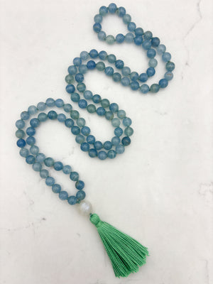 lemurian aquatine calcite gemstone mala with moonstone guru bead and green tassel | radiant malas | handmade in boulder, colorado
