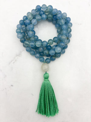 lemurian aquatine calcite gemstone mala with moonstone guru bead and green tassel | radiant malas | handmade in boulder, colorado