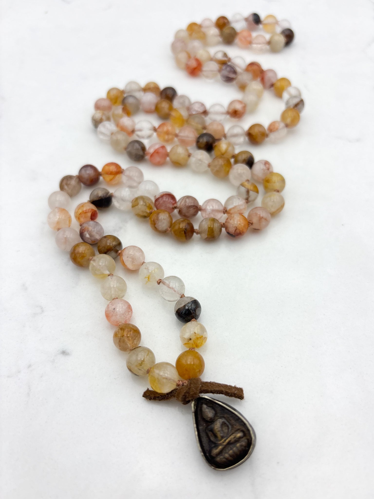 lepidochrosite gemstone mala with brass buddha pendant | radiant malas | handmade in boulder, colorado