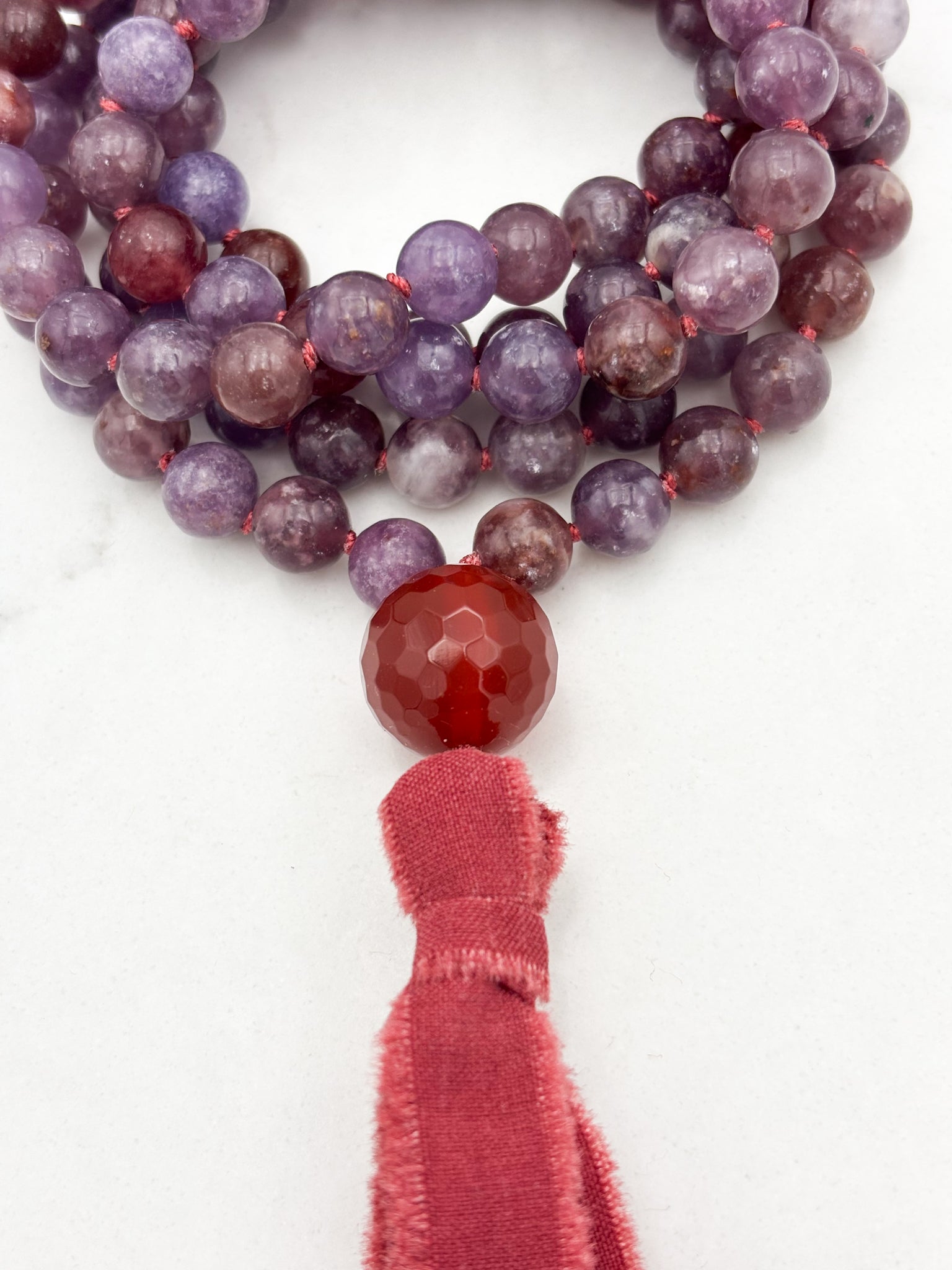 lepidolite gemstone mala necklace with carnelian guru bead and red silk  tassel | radiant malas | handmade in boulder, colorado