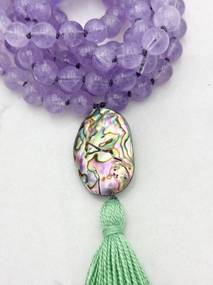 lilac amethyst gemstone mala with abalone shell guru bead and green tassel | radiant malas | handmade in boulder, colorado