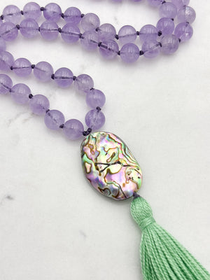 lilac amethyst gemstone mala with abalone shell guru bead and green tassel | radiant malas | handmade in boulder, colorado