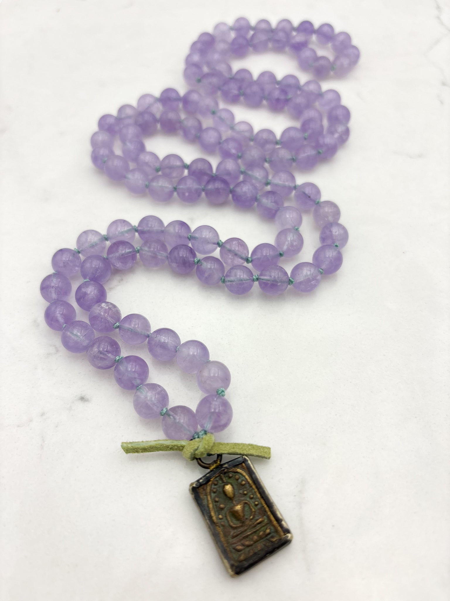 lilac amethyst gemstone mala with brass buddha pendant | radiant malas | handmade in boulder, colorado