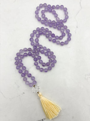 lilac amethyst gemstone mala with faceted quartz guru bead and yellow tassel | radiant malas | handmade in boulder, colorado