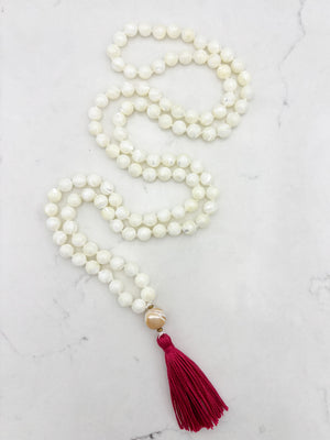 mother of pearl gemstone mala with mother of pearl guru bead and pink tassel | radiant malas | handmade in boulder, colorado