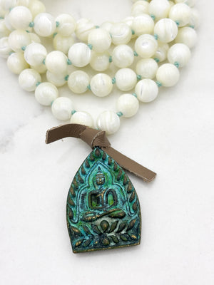 mother of pearl gemstone mala necklace with green brass buddha pendant | radiant malas | handmade in boulder, colorado