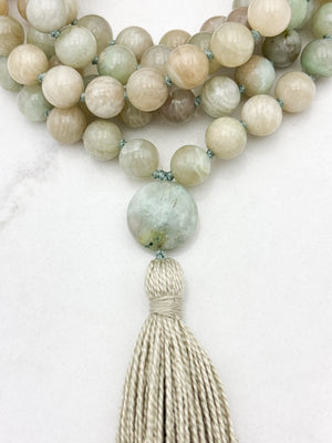 madagascar moonstone mala with azurite guru bead and beige tassel | radiant malas | handmade in boulder, colorado