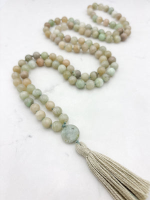 madagascar moonstone mala with azurite guru bead and beige tassel | radiant malas | handmade in boulder, colorado
