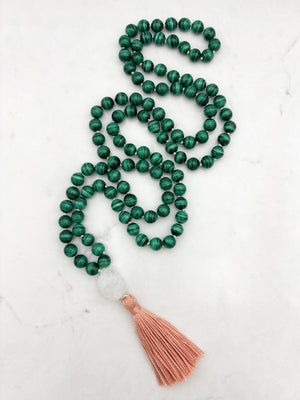 malachite gemstone mala with rock quartz guru bead and peach tassel | radiant malas | handmade in boulder, colorado