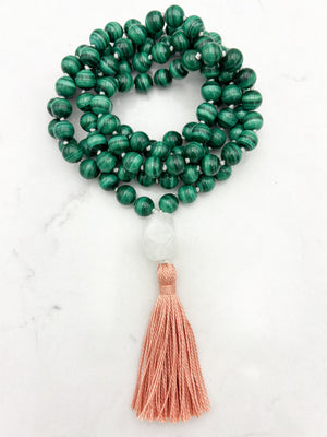 malachite gemstone mala with rock quartz guru bead and peach tassel | radiant malas | handmade in boulder, colorado