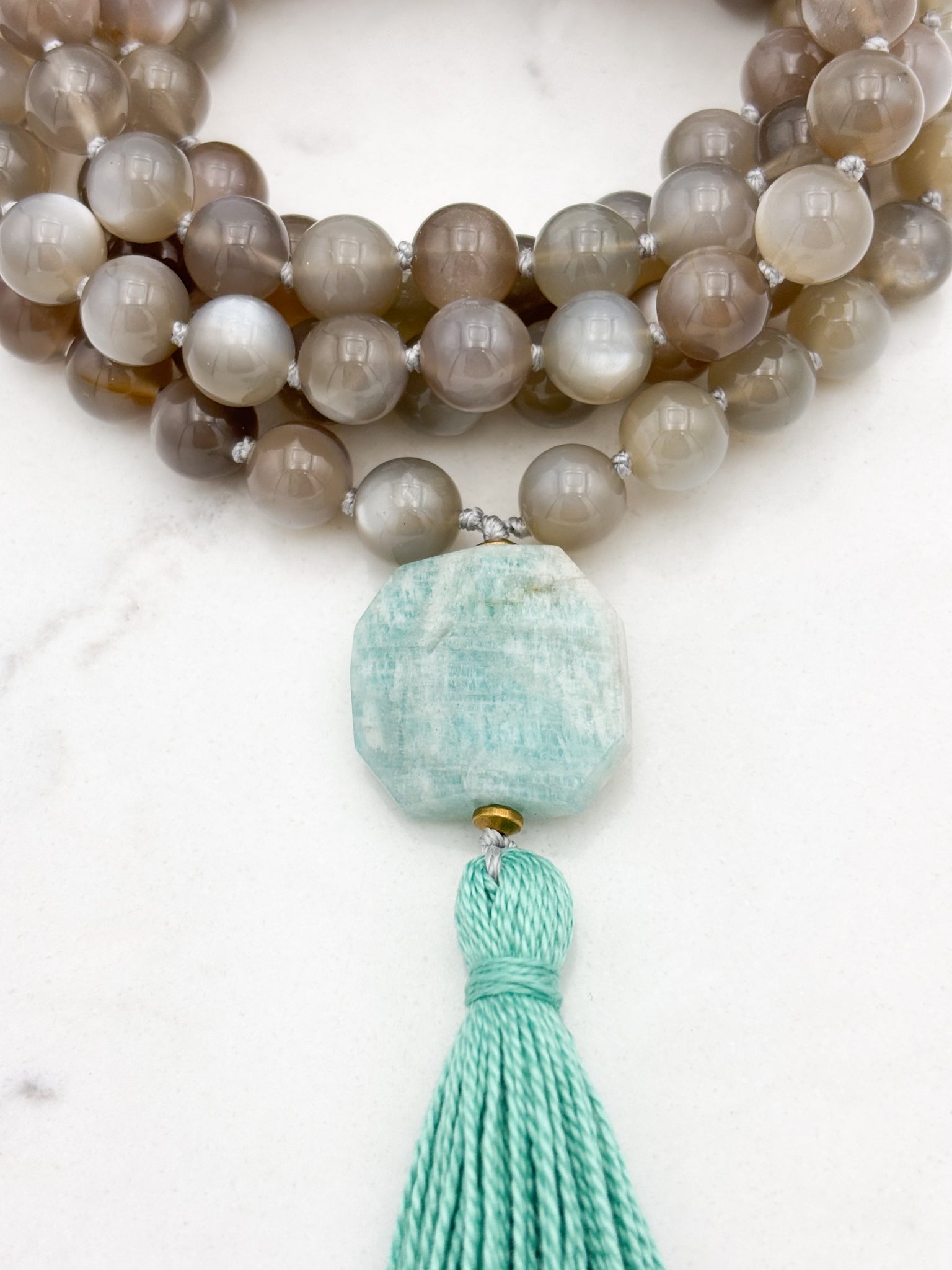 moonstone gemstone mala with amazonite guru bead and teal tassel | radiant malas | handmade in boulder, colorado