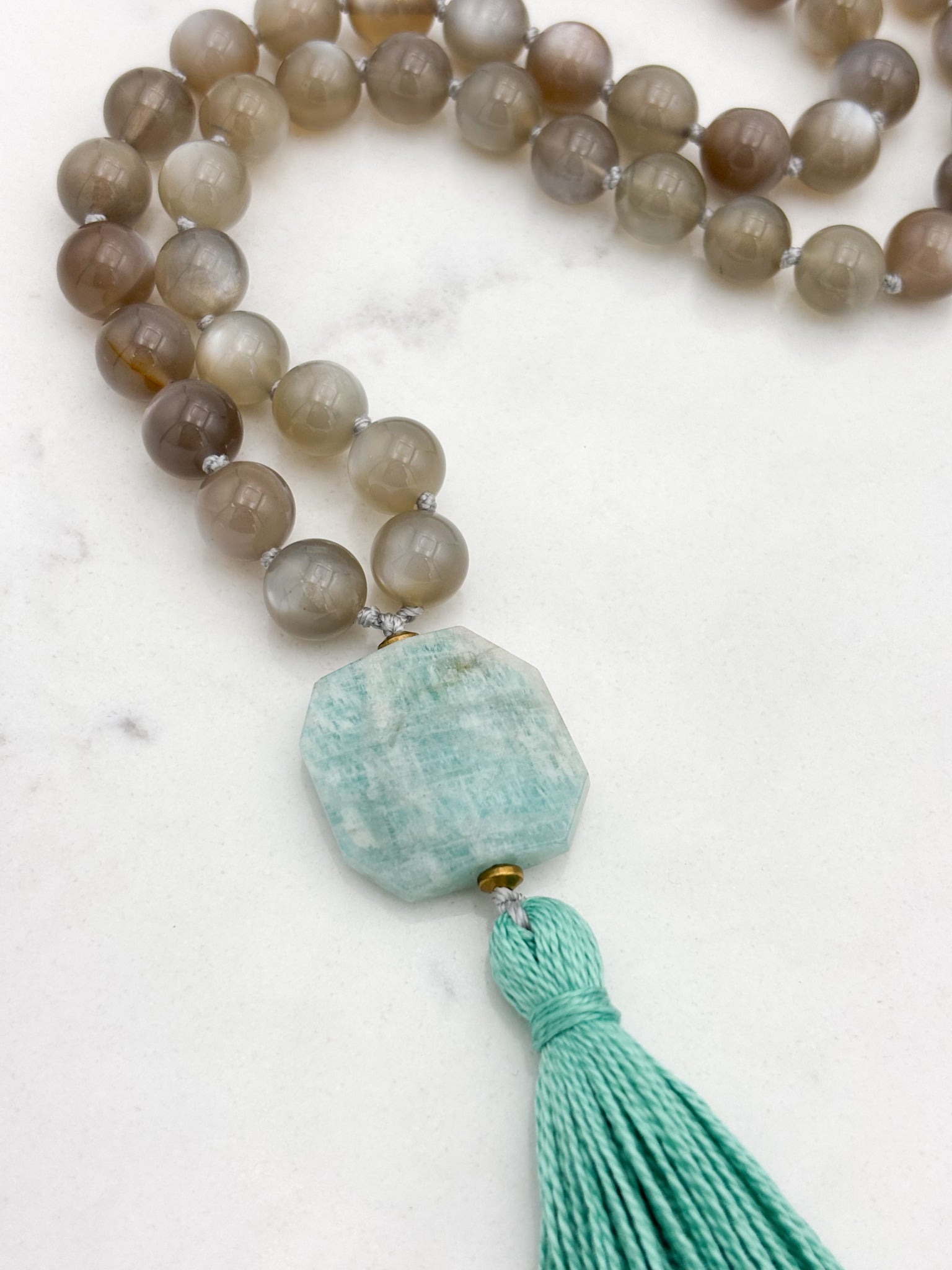 moonstone gemstone mala with amazonite guru bead and teal tassel | radiant malas | handmade in boulder, colorado