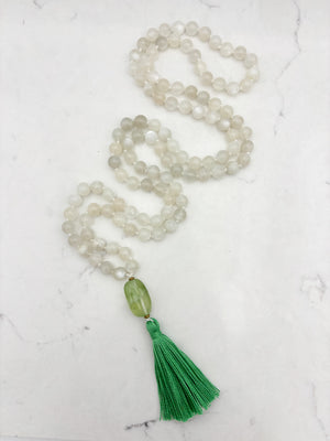 moonstone gemstone mala necklace with fluorite guru bead and green tassel | handmade in boulder, colorado | radiant malas