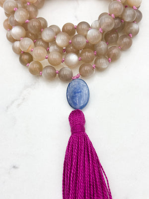 moonstone gemstone mala with kyanite guru bead and bright pink tassel | radiant malas | handmade in boulder, colorado
