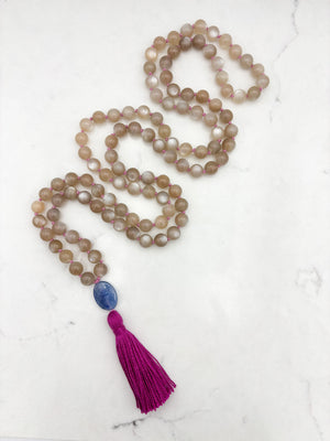 moonstone gemstone mala with kyanite guru bead and bright pink tassel | radiant malas | handmade in boulder, colorado