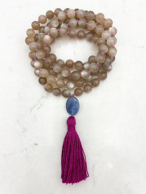 moonstone gemstone mala with kyanite guru bead and bright pink tassel | radiant malas | handmade in boulder, colorado