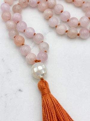 morganite gemstone mala with mosaic mother of pearl guru bead and orange tassel | radiant malas | handmade in boulder, colorado