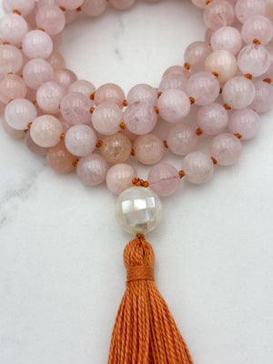 morganite gemstone mala with mosaic mother of pearl guru bead and orange tassel | radiant malas | handmade in boulder, colorado