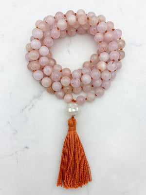 morganite gemstone mala with mosaic mother of pearl guru bead and orange tassel | radiant malas | handmade in boulder, colorado