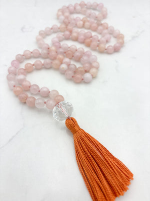 morganite gemstone mala with faceted rock quartz guru bead and orange tassel | radiant malas | handmade in boulder, colorado