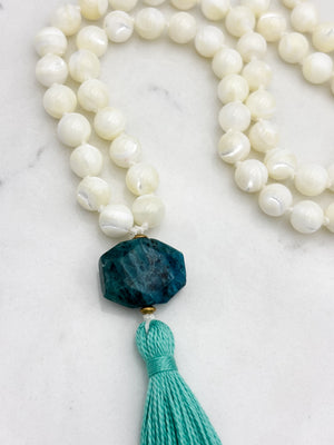 mother of pearl gemstone mala with blue apatite guru bead and teal tassel 
| radiant malas | handmade in boulder, colorado